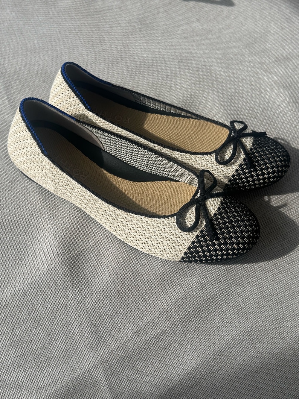 Rothy's Black and Cream Knit Ballet Flats with Bow